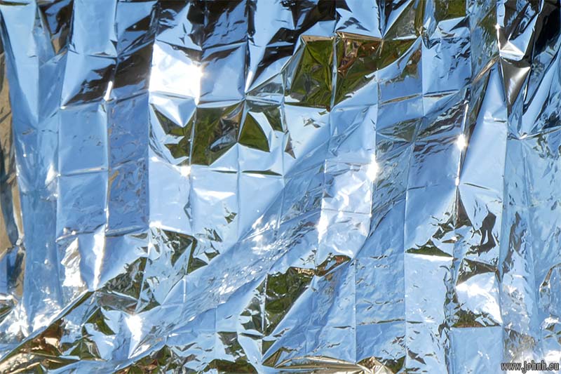 Images made with solar film keeping heat out of windows.